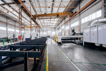 Metal processing workshop with machine tools at plant