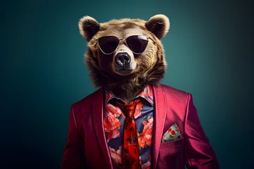 Poster Cool looking bear wearing funky fashion dress - jacket, tie, sunglasses, plain colour background, stylish animal posing as supermodel © sam