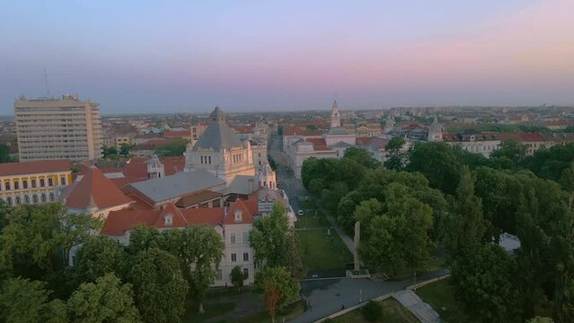 Aerial footage over Arad city center. Video was shot from a drone, in the morning, while flying forward at low altitude above the street, with camera level.