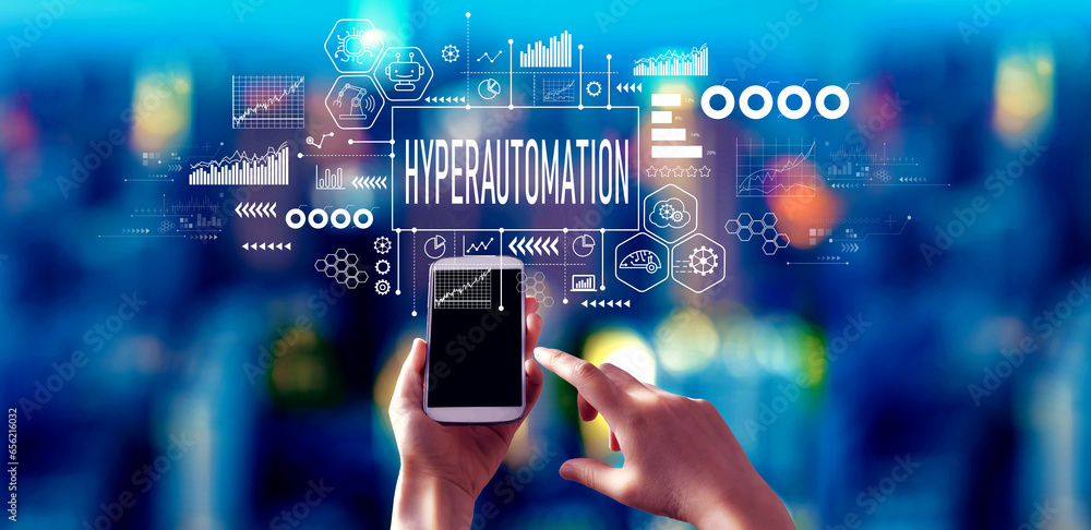 Poster hyperautomation theme with person using a smartphone in a city at night