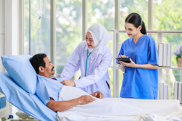 Asian professional successful experienced muslim female doctor in white lab coat with hijab...