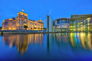 The Reichstag and the Paul-Loebe-Haus at the river Spree in Berlin at dawn