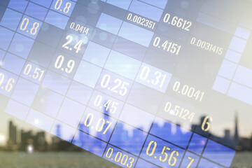 Abstract virtual analytics data spreadsheet on blurry skyscrapers background, analytics and analysis concept. Multiexposure