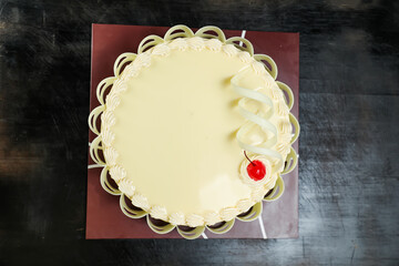 Vanilla Cake include cream, sugar, red berry served on board isolated on napkin top view of cafe food