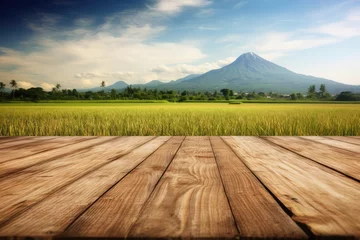 Foto op Plexiglas Rijstvelden Table wooden board with rice field , mountain and blue sky background ,Generative AI.