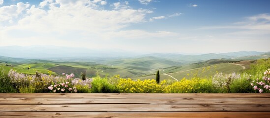 Tuscan landscape in background on wooden desk