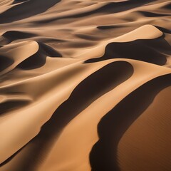 Fototapeta na wymiar An aerial photograph of a vast desert landscape, showcasing intricate sand dunes and patterns3