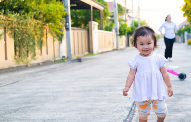 Asian newborn baby kid eye contact with mom cuteness of children with happy family on soft mattress metaphor living life healthy lifestyle cute of kid baby products health products for mother and baby