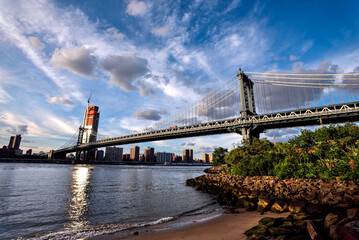 
The Manhattan Bridge seen from the Pebble Beach in Brooklyn Bridge Park - New York City
