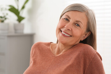 Portrait of beautiful senior woman at home