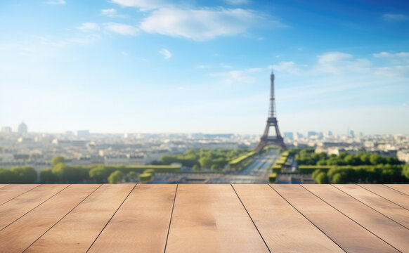 Empty wooden table with blurred Paris background. Table top product display showcase stage. Image ready for montage your text or product.