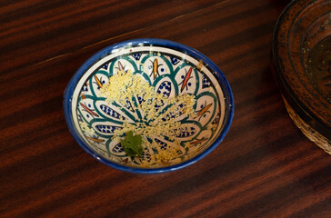 Dirty Moroccan Plate, Empty Bowl after Dinner, Finished Lunch, Oil and Smeared Sauce