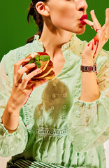 Breakfast. Food pop art photography. woman holding sweet pancakes, licking fingers in jam. Vintage,...