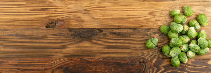 Brussels Sprouts on Wood Background, Brassica Oleracea Cabbage Pile