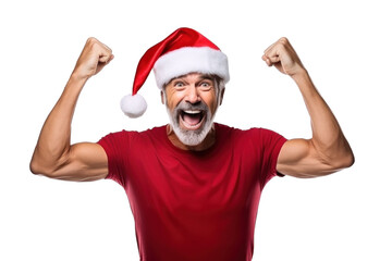 Fototapeta premium Isolated portrait of an excited man with open mouth wearing a Christmas santa hat with raising hands on a transparent background. Winner celebrating success