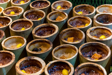 Thai food, khao lam, thai sticky rice in bamboo in market