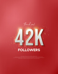 Thank you 42k followers with white numbers wrapped in shiny gold.