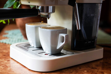 Blurred image of making coffee in a coffee machine.