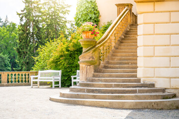 Historical outdoor stone staircase in the chateau on sunny summer day