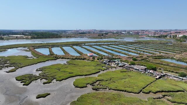 Drone shot of some swomp area and wierd long manmade ponds in Corrois area south of Lisbon.