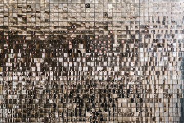 Silver glitter sparkles on background. Space with flickering and glittering metallic particles....