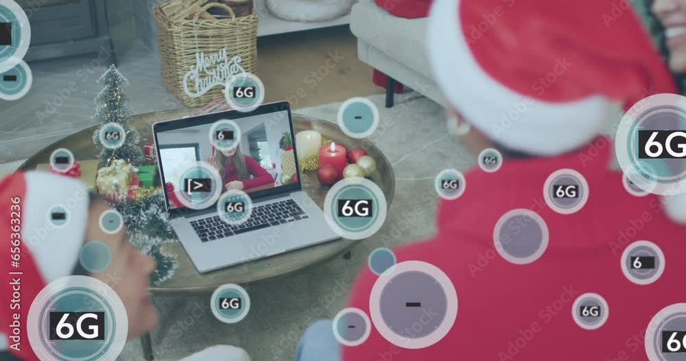 Poster animation of 5g text and data processing over caucasian man using laptop at christmas