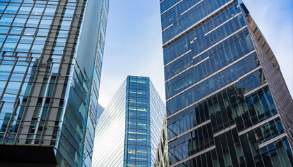 Fototapeta na wymiar Reflective skyscrapers, business office buildings