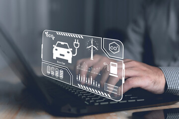 Car engine checks with hologram in dashboard interface on blurry repairman in garage. The concept of engine service hologram communication. Creative automobile, charging, and futuristic technology.