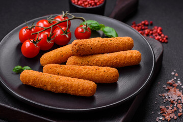 Delicious crispy cheese sticks with mozzarella, salt and spices, breaded and fried in oil