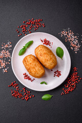 Delicious baked potato cutlet stuffed with chicken and vegetables, spices and salt