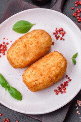 Delicious baked potato cutlet stuffed with chicken and vegetables, spices and salt