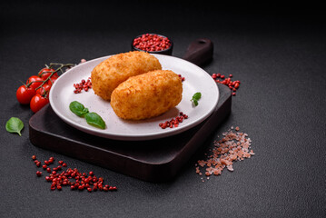 Delicious baked potato cutlet stuffed with chicken and vegetables, spices and salt