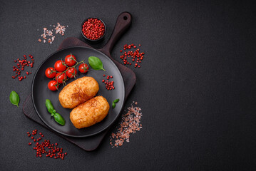 Delicious baked potato cutlet stuffed with chicken and vegetables, spices and salt - obrazy, fototapety, plakaty