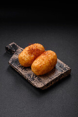 Delicious baked potato cutlet stuffed with chicken and vegetables, spices and salt