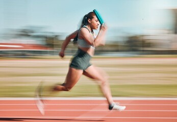 Action, speed and woman athlete running relay sprint in competition for fitness game and training for energy wellness on a track. Sports, stadium and athletic person or runner exercise and workout - obrazy, fototapety, plakaty