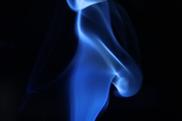 Blue smoke on a dark background, fog pattern, detailed smoke shapes	