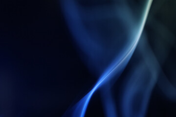 Yellow and blue smoke on a dark background, colourful abstract, one line, minimalistic art	