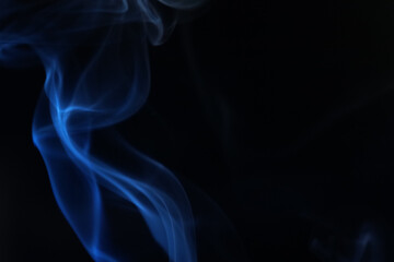 Blue smoke on a dark background, fog pattern, detailed smoke shapes	
