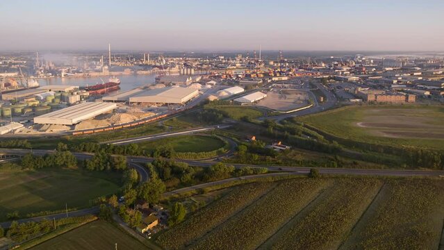 Aerial time-lapse of industrial and port area of Ravenna,production district is made up of a chemical and petrochemical pole, thermoelectric and metallurgical plants.