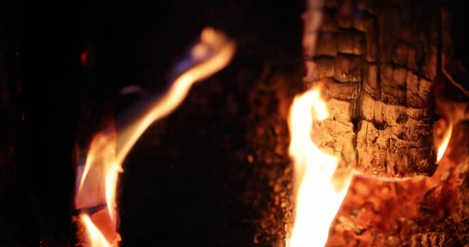Burning smoldering wood and coals in fireplace. Cooking in natural grill concept