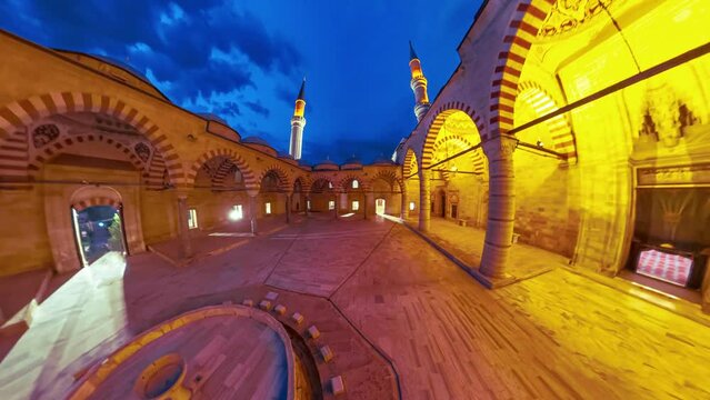Courtyard of Uc Serefeli Mosque in Edirne, Turkey, offers mesmerizing 360 panorama. Surrounded by elegant minarets and intricate arches, the courtyard showcases Ottoman architectural splendor at night
