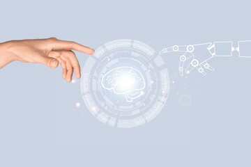 Obraz premium Human fingers with icon of robot fingers, ai concept