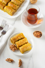 Pistachio baklava. Close-up baklava isolated on white background. Mediterranean cuisine delicacies