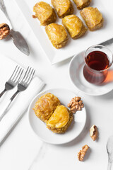 Pistachio baklava. Close-up baklava isolated on white background. Mediterranean cuisine delicacies