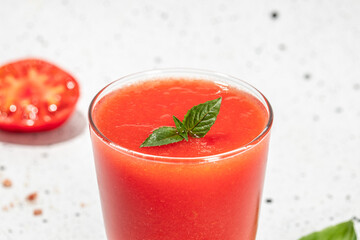 Tomato juice in a glass and fresh tomatoes. organic healthy products. Detox and clean diet concept. place for text, top view