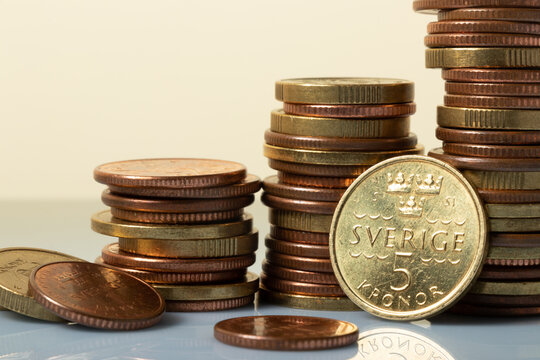 Swedish krona coins on a white background