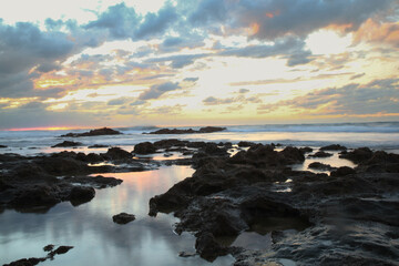 Reflecting clouds on little puddles