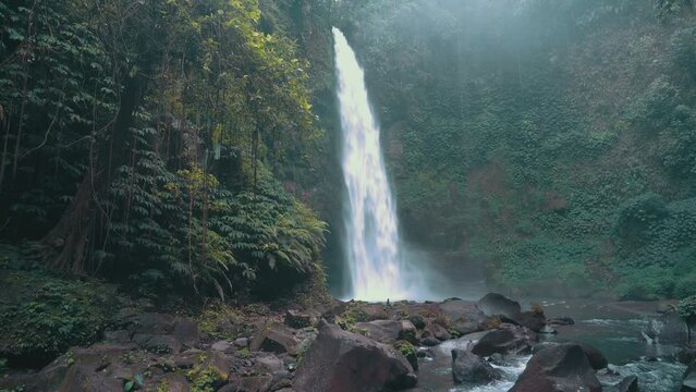 Sekumpul Waterfall Bali Indonesia, the highest and most beautiful Bali waterfall Sekumpul in tropical rainforest jungle Asia 4K Aerial view