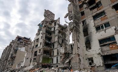 destroyed and burned houses in the city during the war in Ukraine