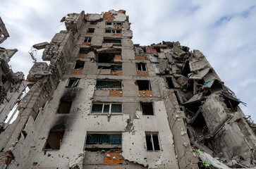 destroyed and burned houses in the city during the war in Ukraine